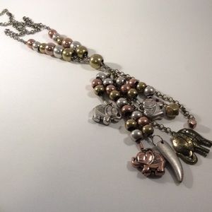 Long oversized layered elephant mixed metal statement necklace